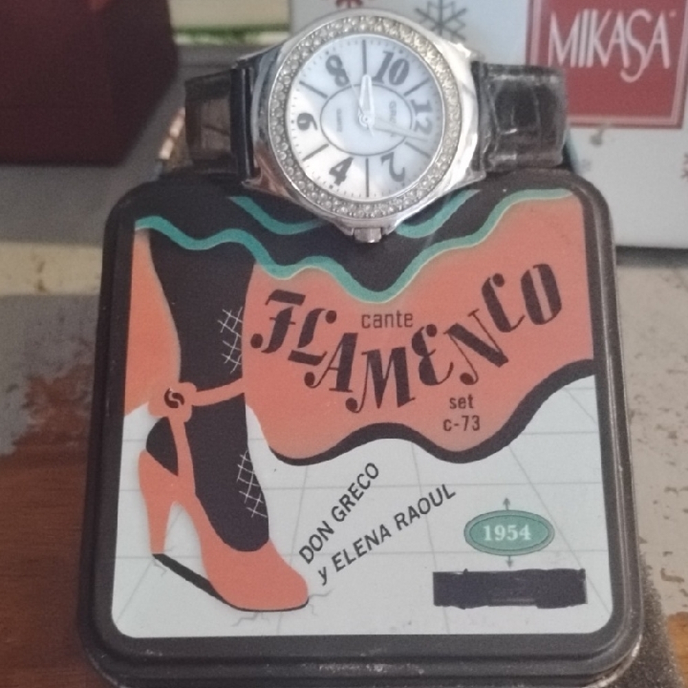 Elegant Silver and Black Watch with Crystal Accents